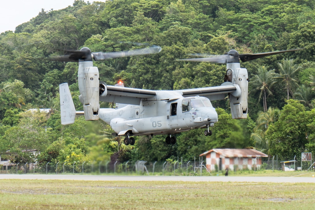U.S. Marines with Marine Medium Tiltrotor Squadron 268 (Reinforced), Marine Rotational Force – Darwin 24.3, prepare to land an MV-22B Osprey during Operation Render Safe 2024-2 at Munda International Airport, New Georgia, Solomon Islands, Sept. 8, 2024. Operation Render Safe 2024-2 is an Australian-led operation to exchange explosive ordnance tactics, techniques and procedures and reduce the risk of explosive remnants of war. From Aug. 30 to Sept. 13, the MRF-D 24.3 Marine Air-Ground Task Force deploys select explosive ordnance disposal teams, role 2 medical, Ospreys and force protection elements to the Solomon Islands for participation in Australian Defence Force’s execution of Operation Render Safe 2024-2 in order to enhance relationships with partner nations in the South Pacific. (U.S. Marine Corps photo by Gunnery Sgt. Kassie McDole)