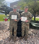 Staff Sgts. Ian Wilding, Delta Company 141st Brigade Support Battalion, and Chris Yoder, Fox Company 181st Brigade Support Battalion, show off their awards following the 2024 National Guard Best Mechanic of the Year competition at Camp Williams, Utah, Aug. 25, 2024. Wilding took top honors; Yoder finished fourth out of 26 competitors.