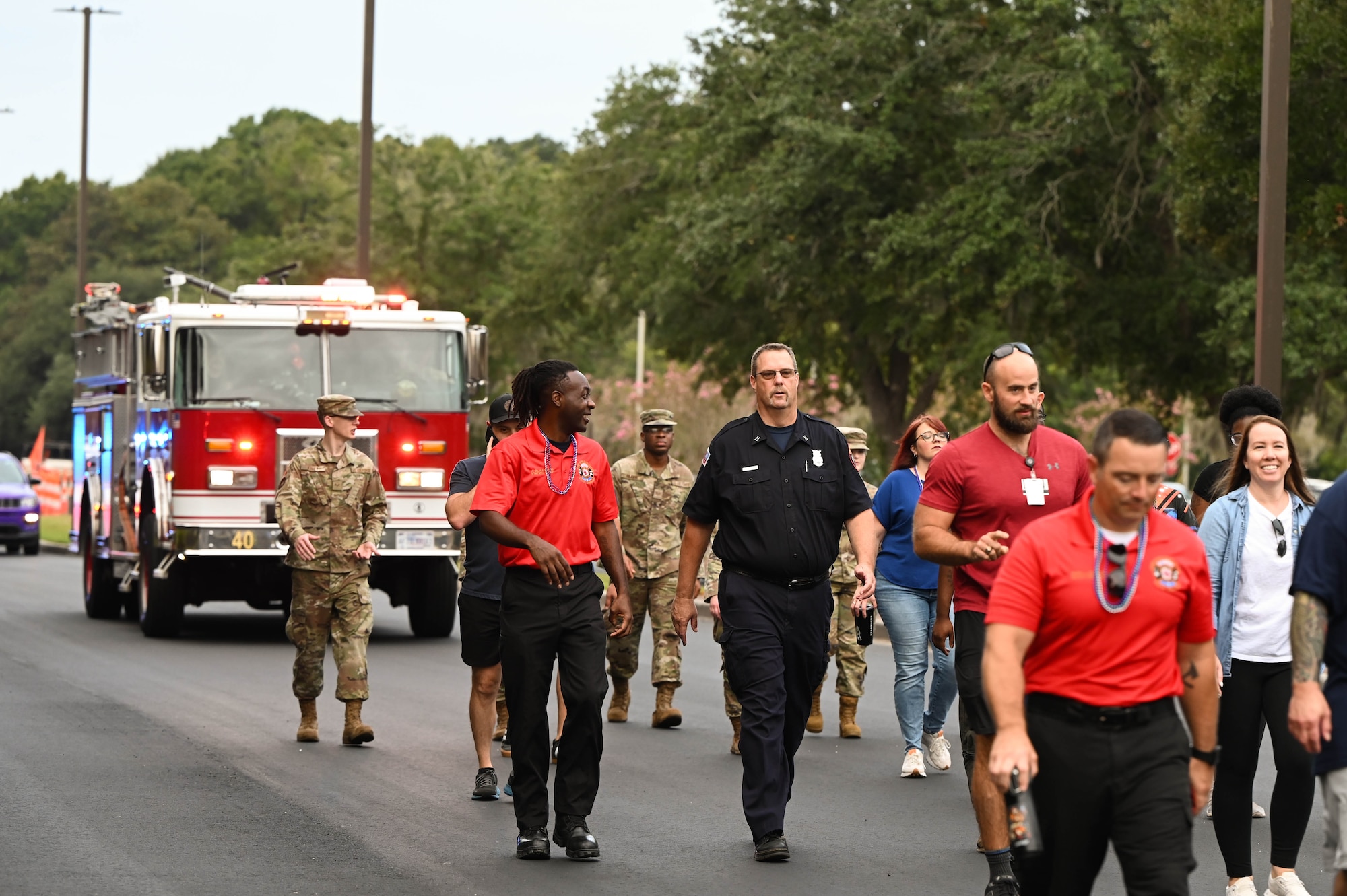 Firefighter walk down the street