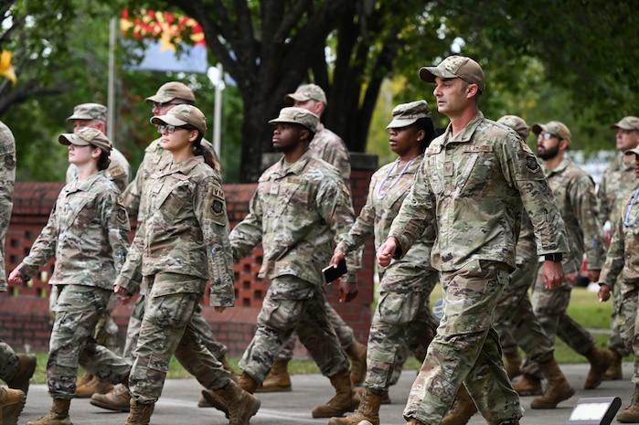 Airmen march in formation