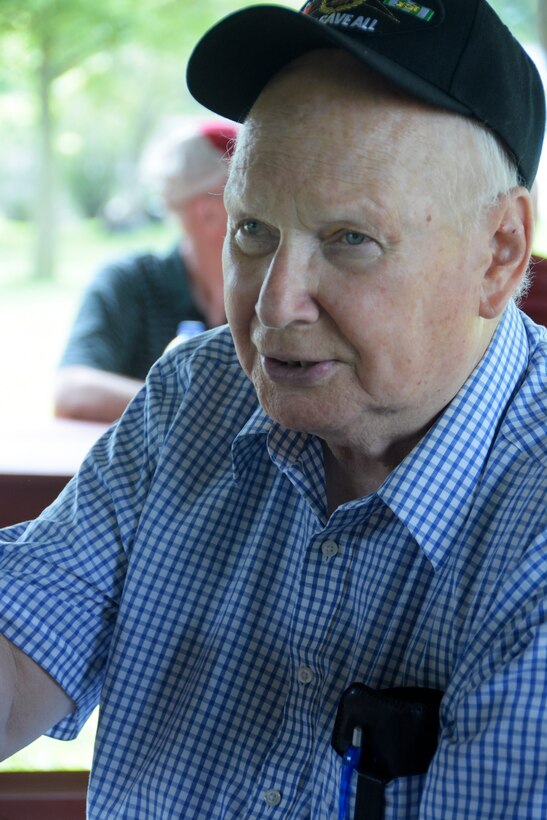 Jake Vogt reminisces during a reunion for the Wisconsin Army National Guard’s 229th Engineer Company in Platteville, Wis., Aug. 1. Vogt served in Vietnam while in the U.S. Marine Corps, then deployed with the 229th to Desert Storm in 1990-91 and near Tikrit, Iraq in 2003. Unit members were also involved in numerous local training areas — projects today referred to as innovative readiness training — such as athletic fields, campsites and parking pads for fuel tankers. Wisconsin Department of Military Affairs photo by Vaughn R. Larson