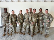 Maryland Air National Guard Airmen pose for a group photo during the Cyber Fortress 3.0 exercise at Virginia Army National Guard’s State Military Reservation July 20, 2024. The training exercise tested the local, state and federal response to potential cyber attacks against critical infrastructure.