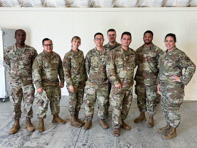 Maryland Air National Guard Airmen pose for a group photo during the Cyber Fortress 3.0 exercise at Virginia Army National Guard’s State Military Reservation July 20, 2024. The training exercise tested the local, state and federal response to potential cyber attacks against critical infrastructure.