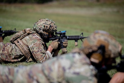 Oklahoma Army National Guard Staff Sgt. Justin Burns with 1st Battalion, 279th Infantry Regiment, 45th Infantry Combat Team,  fires an M4 Carbine during the 2024 Governor's 20 Marksmanship Competition, Sept. 7, 2024 at Camp Gruber Training Center, Oklahoma. The Oklahoma National Guard Governor’s 20 is an annual competition where Oklahoma Army and Air National Guardsmen compete in a series of shooting events to showcase the Oklahoma National Guard’s top marksmen. (Oklahoma National Guard photo by Sgt. Haden Tolbert)