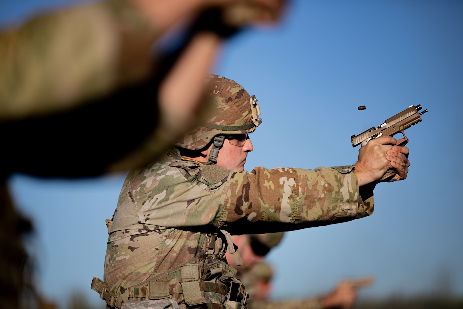 Oklahoma Army National Guard Spc. Darin Carney fires an M17 Pistol during the 2024 Governor's 20 Marksmanship Competition, Sept. 8, 2024, at Camp Gruber Training Center, Oklahoma. The Oklahoma National Guard Governor’s 20 is an annual competition where Oklahoma Army and Air National Guardsmen compete in a series of shooting events to showcase the Oklahoma National Guard’s top marksmen. (Oklahoma National Guard photo by Sgt. Haden Tolbert)