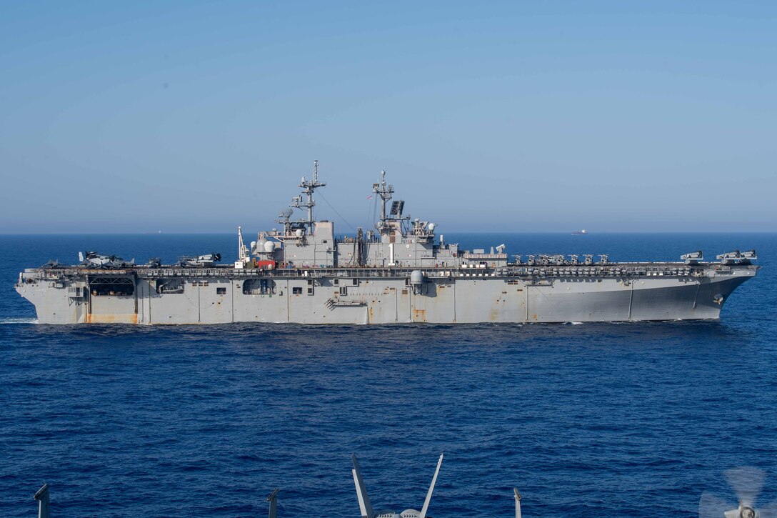 240630-N-HE057-1078 MEDITERRANEAN SEA (June 30, 2024) The Wasp-class amphibious assault ship USS WASP (LHD 1) steams in formation with the Dwight D. Eisenhower Carrier Strike Group (IKECSG), the Royal Navy Daring-class air-defense destroyer HMS Duncan (D 37) and the remaining components of the Wasp Amphibious Ready Group (WSP ARG) in the Mediterranean Sea, June 30, 2024. The IKECSG is on a scheduled deployment to the Naval Forces Europe area of operations, employed by U.S. 6th Fleet to promote regional security and to deter aggression. (U.S. Navy photo by Mass Communication Specialist 3rd Class Nicholas Rodriguez)