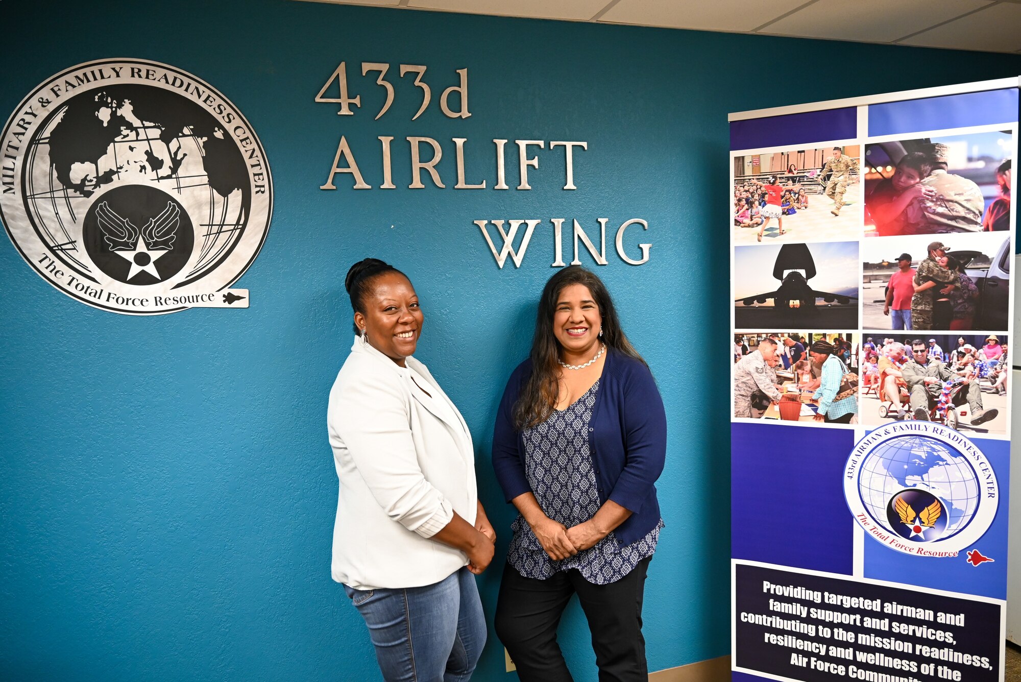 Leticia Gonzalez, 433rd Airlift Wing Military and Family Readiness program manager, poses alongside Nakia Evans, Magellan Federal personal financial counselor, for a photo to showcase the Military and Family Readiness and their programs in their conference room.