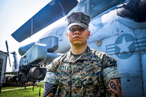 U.S. Marine Corps Sgt. Andrew Gomez, Marine Aircraft Group 49 aviation supply specialist, poses for a photo at Joint Base McGuire-Dix-Lakehurst, N.J., Aug. 14, 2024. Gomez received the Navy and Marine Corps Medal for extricating a passenger from a burning vehicle on June 19, 2023. (U.S. Air Force photo by Senior Airman Matt Porter)