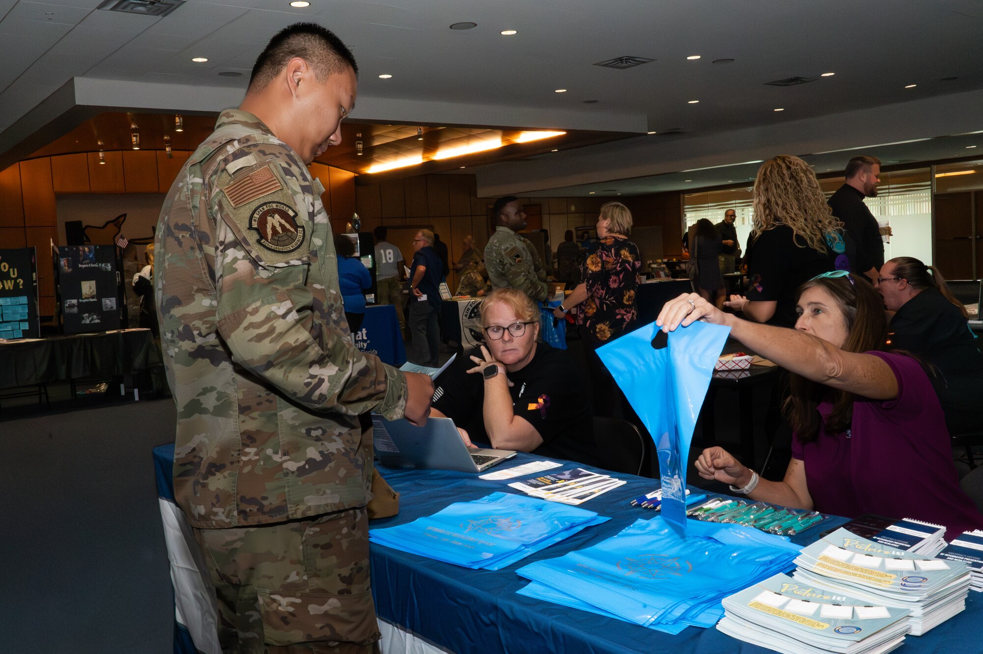 A U.S. Airman is greeted by Tyndall Connects members