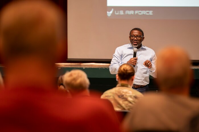 A man speaking to a crowd.