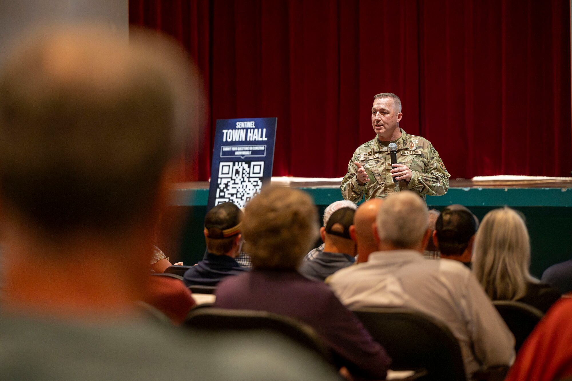 A man speaks to a crowd