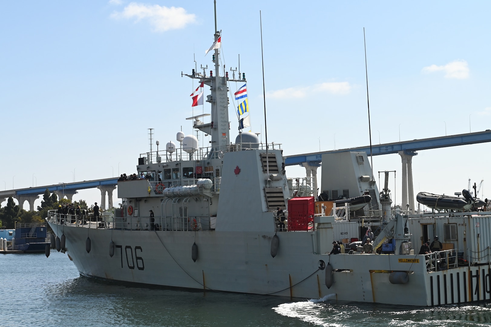 U.S. Coast Guard Capt. Timothy Lavier and Lt. Jared F. Mihalcik meet with the command of the HMCS Yellowknife, while moored in San Diego, Sept. 12, 2024.  The Royal Canadian Navy worked on patrol with a Coast Guard Law Enforcement Detachment to support the counter-narcotics mission. (U.S. Coast Guard photo by Petty Officer 3rd Class Richard Uranga/Released)