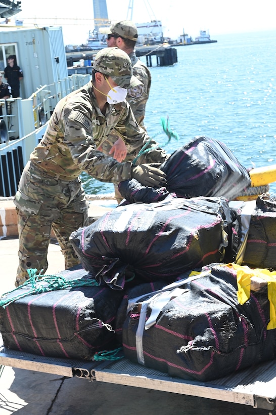 U.S. Coast Guard Capt. Timothy Lavier and Lt. Jared F. Mihalcik meet with the command of the HMCS Yellowknife, while moored in San Diego, Sept. 12, 2024.  The Royal Canadian Navy worked on patrol with a Coast Guard Law Enforcement Detachment to support the counter-narcotics mission. (U.S. Coast Guard photo by Petty Officer 3rd Class Richard Uranga/Released)