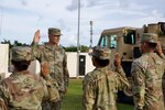 Gen. Randy George, Chief of Staff of the United States Army, re-enlists four Soldiers assigned to Echo Battery, Task Force Talon, 38th Area Defense Artillery Brigade in Guam on September 8, 2024.