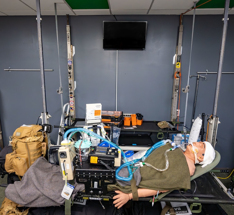 A high-fidelity mannequin is utilized in the 920th Aeromedical Staging Squadron Critical Care Air Transport Team simulation lab