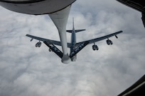 Two USAF aircraft in flight.