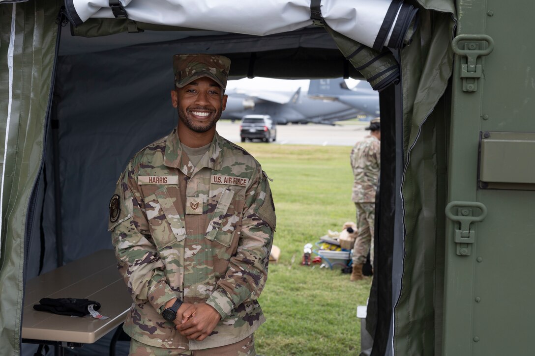 Airman poses for photo in E-SPEK