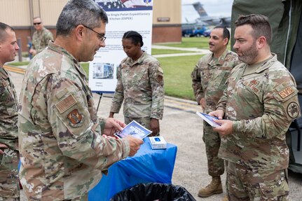 U.S. Air Force members standing outside E-SPEK talking