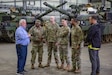 The site director of the Coleman Army Prepositioned Stocks-2 worksite in Mannheim, Germany, Rob Grundy, speaks to key leaders from the 401st Army Field Support Brigade Sept. 11. The 401st AFSB conducted a site visit to the 405th Army Field Support Brigade headquarters and two of its APS-2 worksites Sept. 10-12. to collaborate and discuss best practices. (Joseph Kumzak)