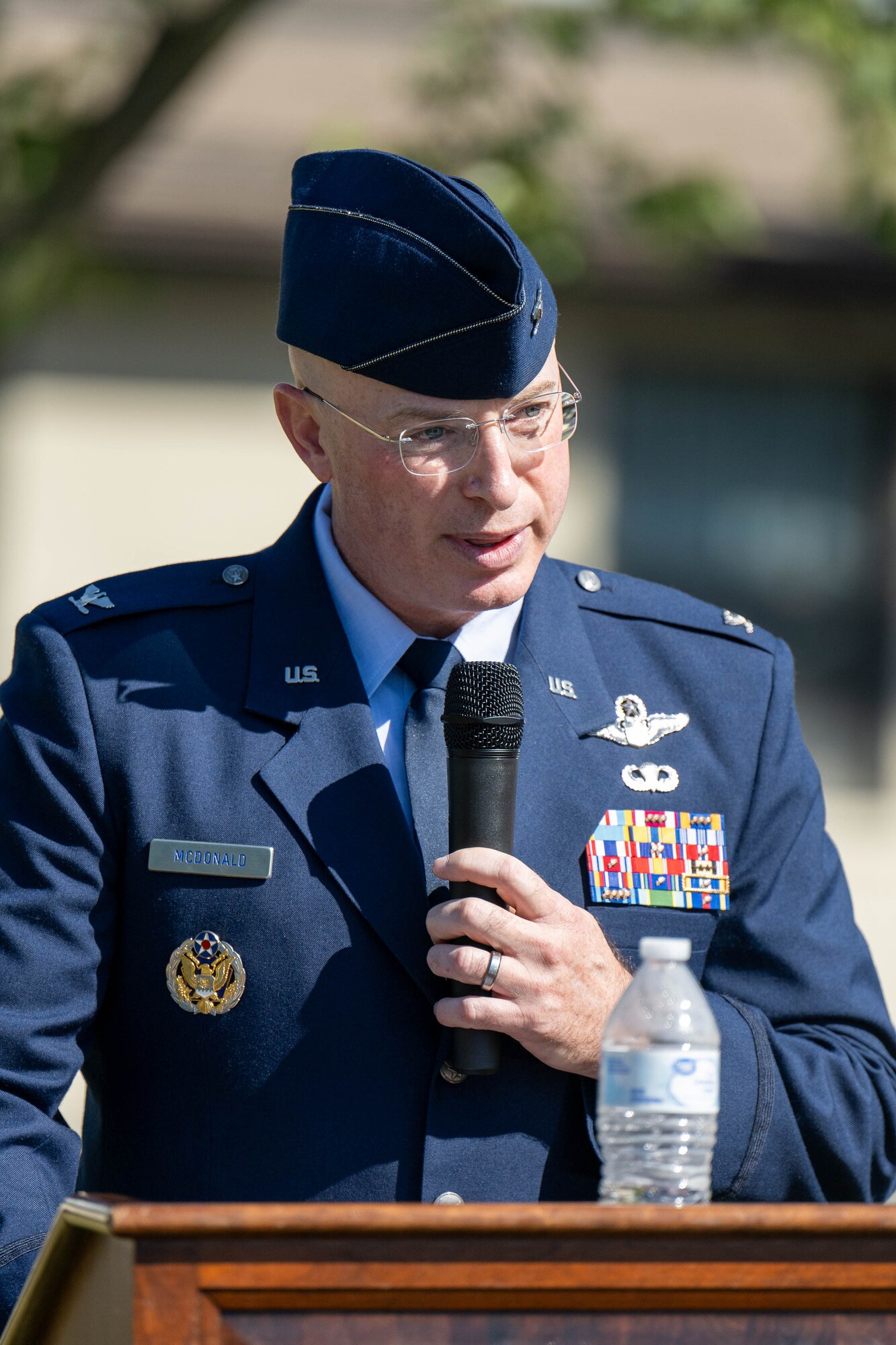 U.S. Air Force Col. Chris McDonald, 436th Airlift Wing commander, gives closing remarks at the 23rd Anniversary 9/11 Memorial Service at the Air Mobility Command Museum on Dover Air Force Base, Delaware, Sept. 11, 2024. The 9/11 Memorial at the museum includes two pieces of steel from the World Trade Center, a rock from the United Airlines Flight 93 crash site and a block from the American Airlines Flight 77 crash site at the Pentagon. (U.S. Air Force photo by Mauricio Campino)