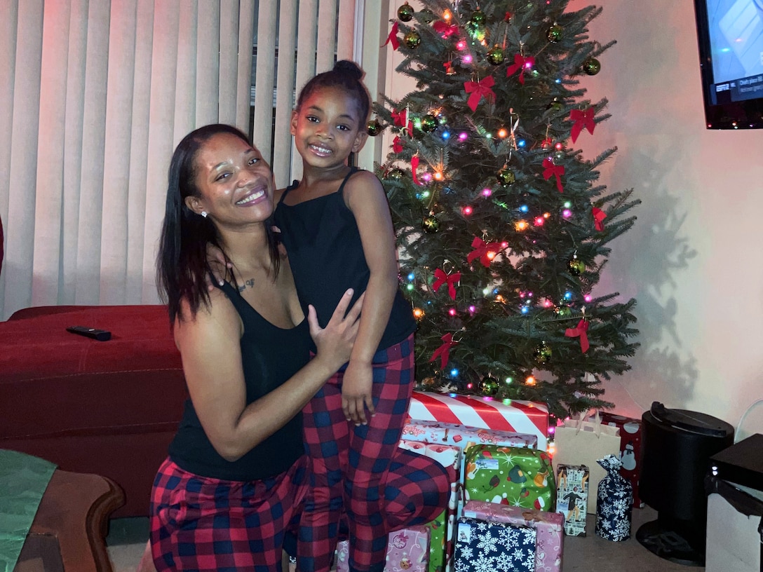 Spc. Dominique Washington with her daughter Lelia at Christmas