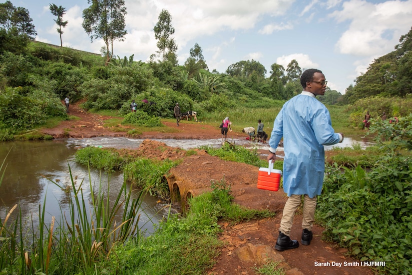 Scientists collect samples near bodies of water.