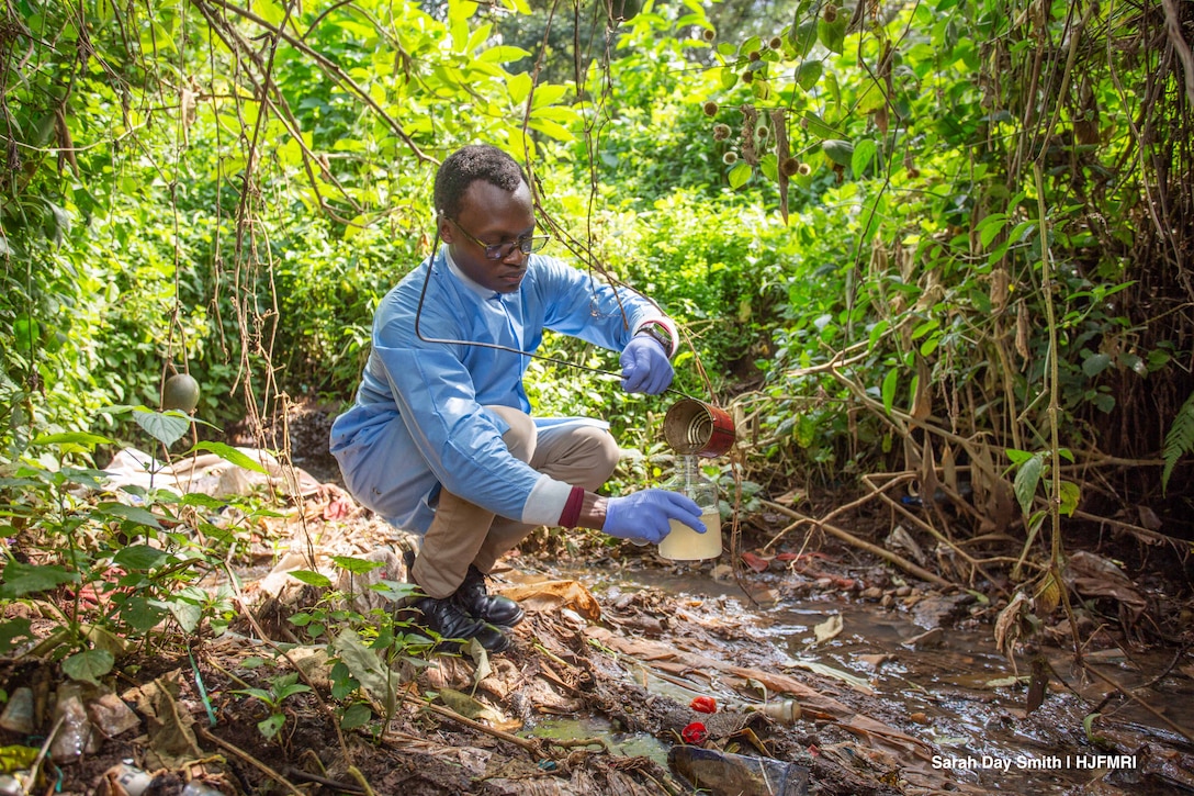 Scientists collect samples near bodies of water.