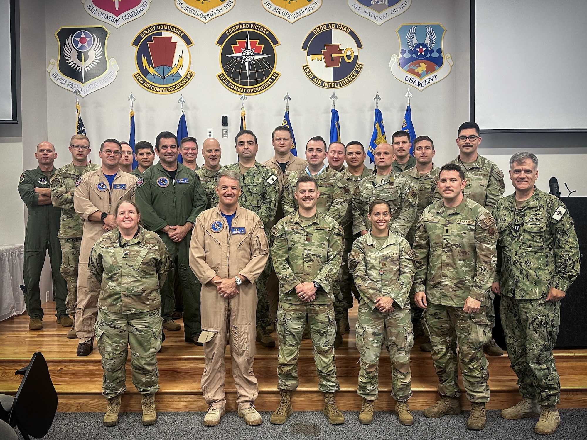 ervice members from the  U.S. 5th Fleet Naval and Amphibious Liaison Element Headquarters and the 193rd Air Operations Group pose for a group photo in State College, Pennsylvania.