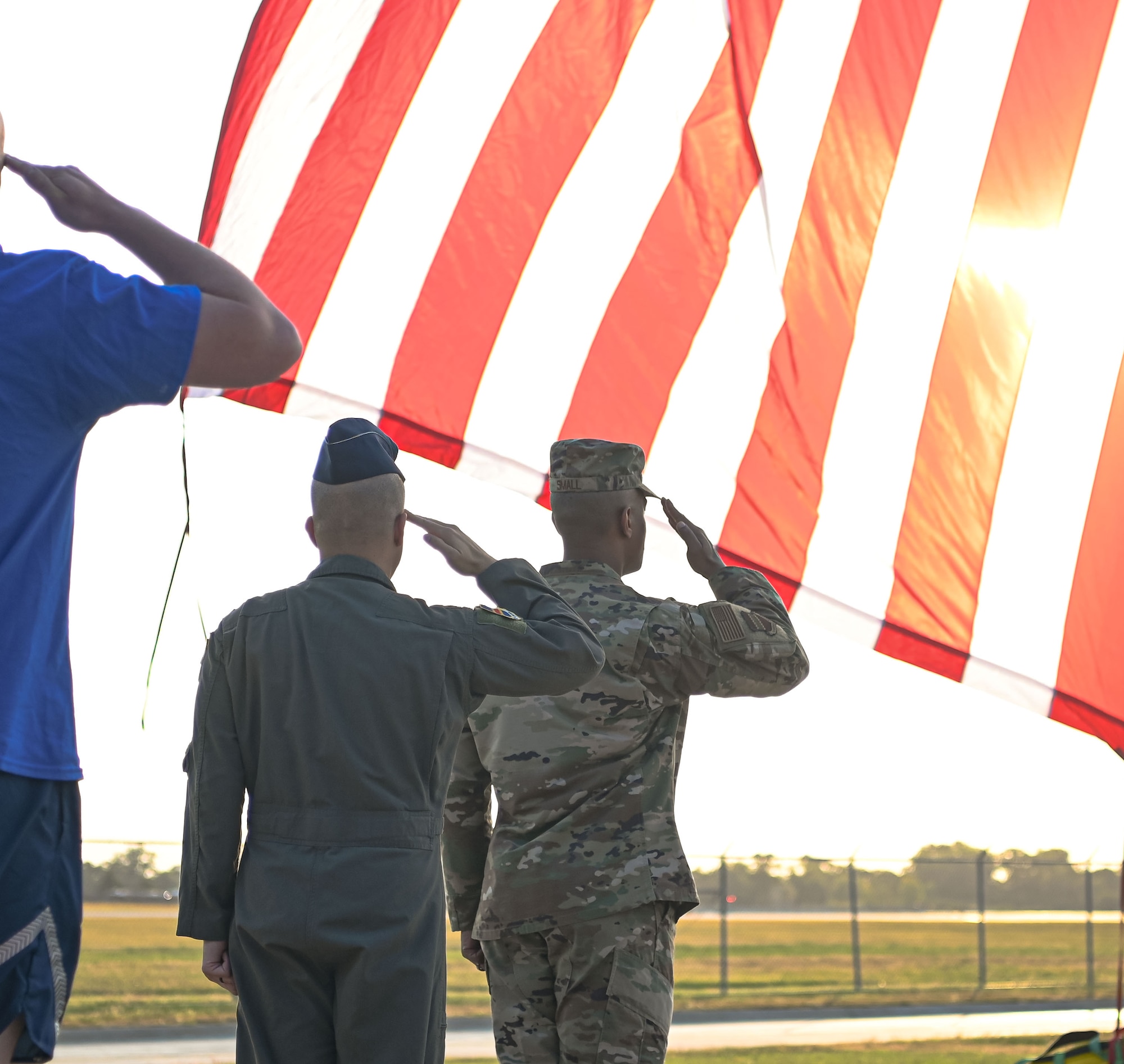 People render a salute to the American flag