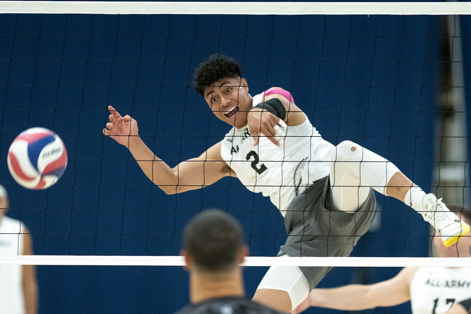 Army Spc. Asaleti Telea of JB Fort Lewis-McChord, Wash. spikes during the 2024 Armed Forces Men’s and Women’s Volleyball Championship held at Fort Carson, Colorado 10-14 September.  Teams from the Army, Navy (with Marine Corps and Coast Guard players) and Air Force (with Space Force players) battle it out for gold.  (DoD photo by EJ Hersom)