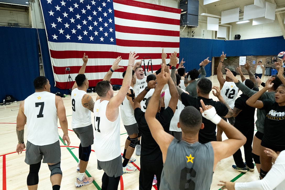 Army Men's Volleyball team celebrate after clinching gold during the 2024 Armed Forces Men’s and Women’s Volleyball Championships at Fort Carson, Colo. Sept. 11, 2024. (DoD photo by EJ Hersom)