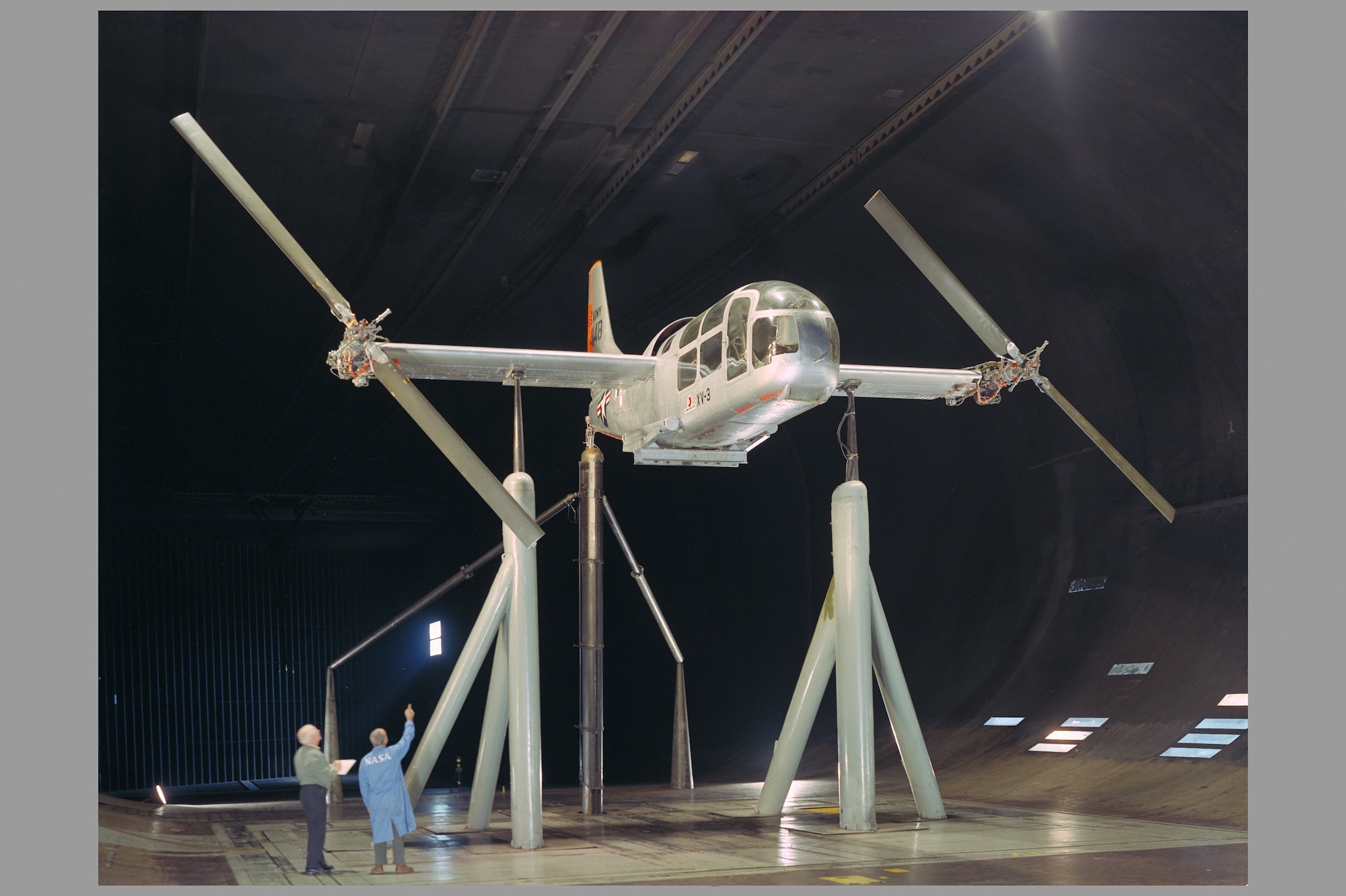 The Bell XV-3 tiltrotor aircraft is set for testing in the 40- by 80-foot wind tunnel at the NASA Ames Research Center at Moffett Field, California, in 1957. The 80th anniversary of the first operation of the tunnel occurred in June. The 40x80, along with the 80- by 120-foot wind tunnel at the Ames Research Center, are managed by Arnold Engineering Development Complex. Together, these two tunnels make up the National Full-Scale Aerodynamics Complex. (NASA photo)