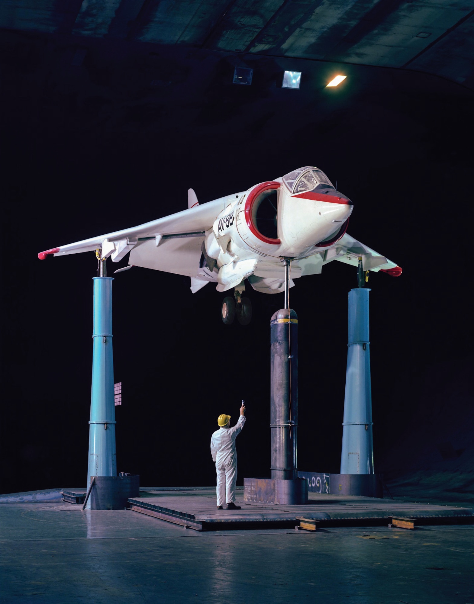 The AV-8B Harrier II is readied for testing in the 40- by 80-foot wind tunnel at the NASA Ames Research Center at Moffett Field, California, in 1976. The 80th anniversary of the first operation of the tunnel occurred in June. The 40x80, along with the 80- by 120-foot wind tunnel at the Ames Research Center, are managed by Arnold Engineering Development Complex. Together, these two tunnels make up the National Full-Scale Aerodynamics Complex. (NASA photo)
