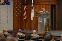 Col. (P) Lenny Williams, Assistant Adjutant General-Army of the Illinois National Guard and Commander of the Illinois Army National Guard, speaks to the approximately 100 warrant officers in attendance at the Illinois National Guard Warrant Officer Symposium on Camp Lincoln in Springfield, Illinois Sept. 12.