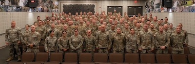 Approximately 100 Illinois Army National Guard warrant officers pose for a photo while in attendance at the Illinois National Guard Warrant Officer Symposium on Camp Lincoln in Springfield, Illinois Sept. 11-12.