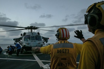 Flight operations aboard USS O'Kane (DDG 77).