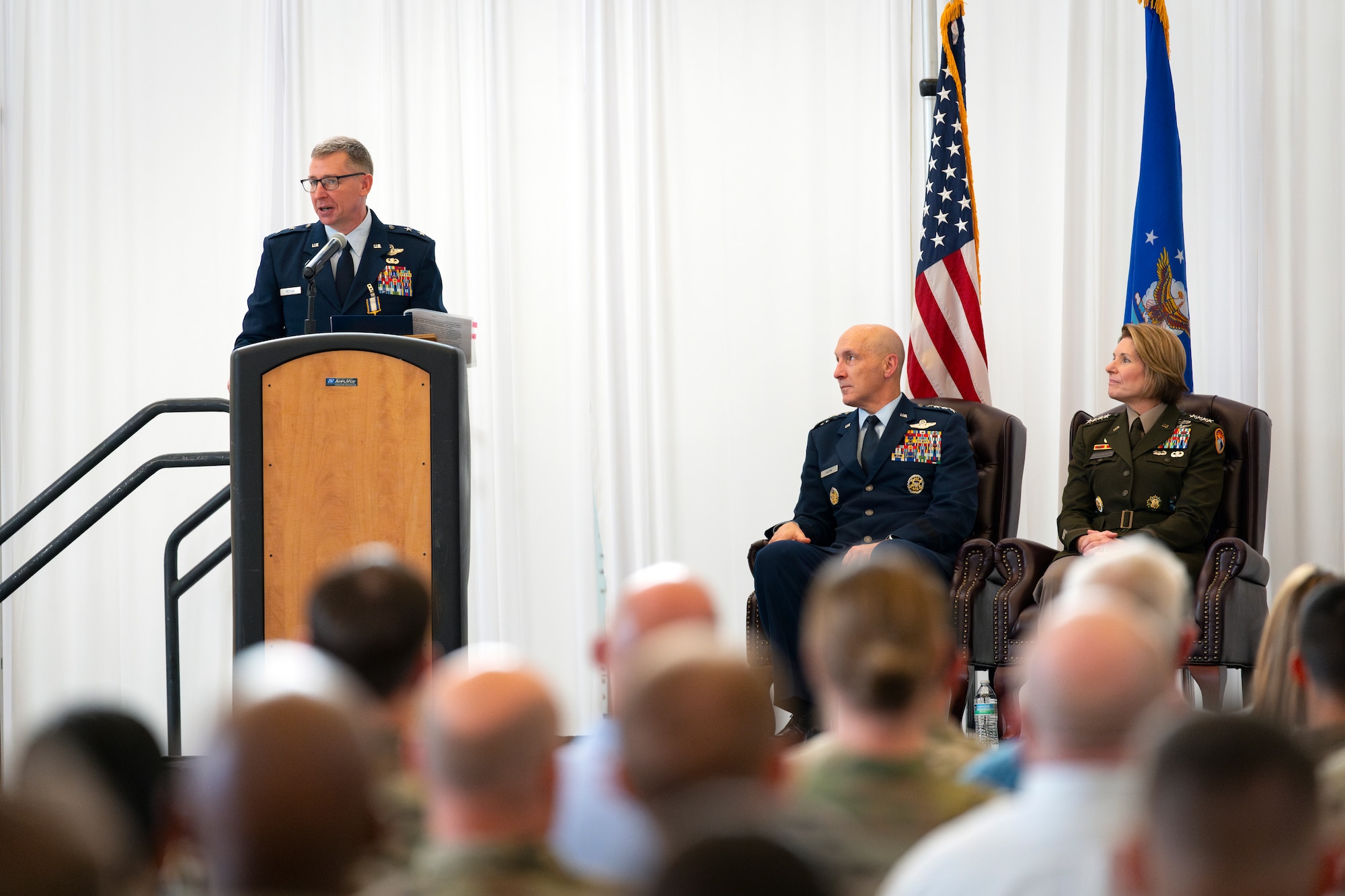 Maj. Gen. Evan Pettus, outgoing Air Forces Southern commander, speaks during a Change of Command ceremony at Davis-Monthan Air Force Base, Arizona, Sep. 11, 2024. Pettus relinquished command to Maj. Gen. David Mineau and will continue his service as the incoming military deputy commander for U.S. Southern Command. (U.S. Air Force photo by Tech. Sgt. Rachel Maxwell)