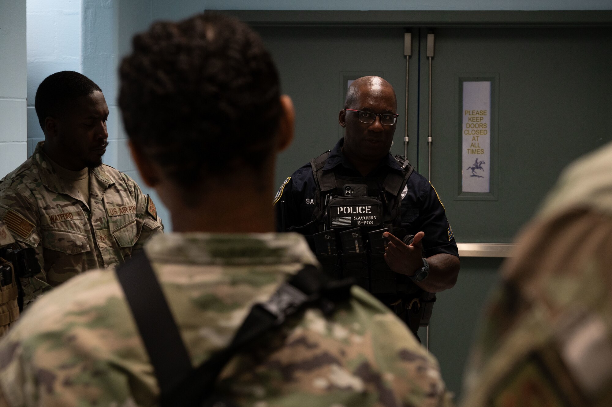 Officer Conrad Savoury, 436th Security Forces Squadron flight sergeant, teaches 436th SFS Airman about school protection during school shooter response training at Dover, Delaware, Sept. 10, 2024. The training was used to aid the 436th SFS in reaffirming readiness in response to an active school shooter. (U.S. Air Force Photo by Senior Airman Dieondiere Jefferies)