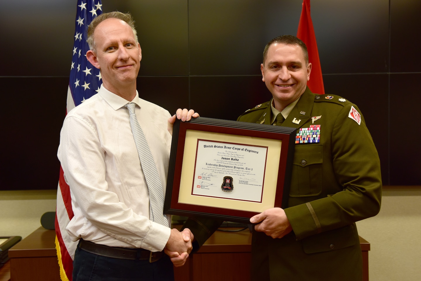 Jason Baltz, U.S. Army Corps of Engineers Nashville District, receives a certificate of completion for the 2024 Leadership Development Program Level II Course from Lt. Col. Robert W. Green, Nashville District commander, during a graduation ceremony Sept. 11, 2024, at the district headquarters in Nashville, Tennessee. (USACE Photo by Lee Roberts)