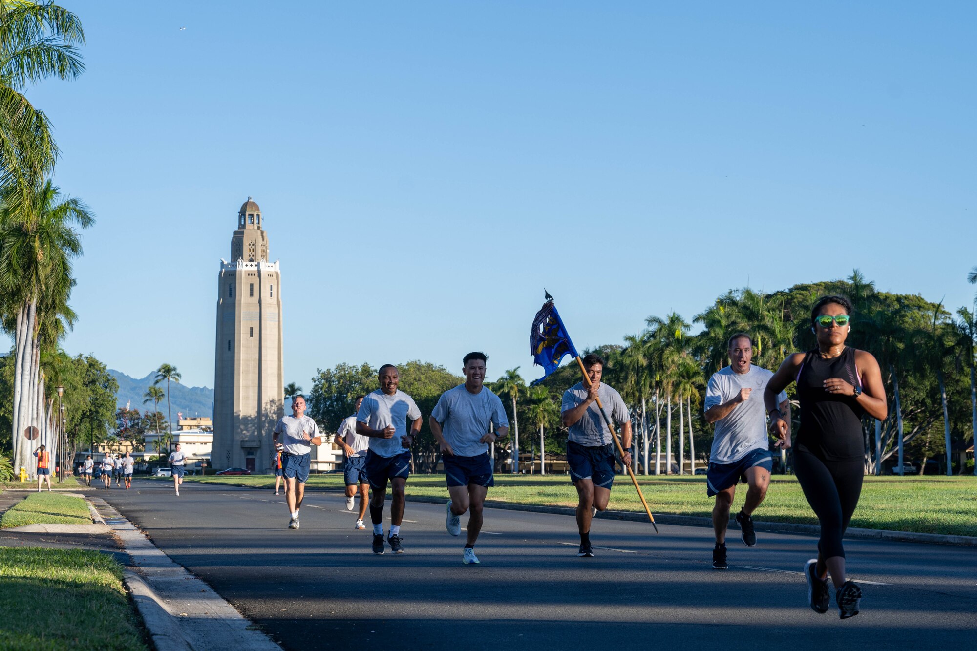 Airmen run on a street during a 9/11 memorial run.
