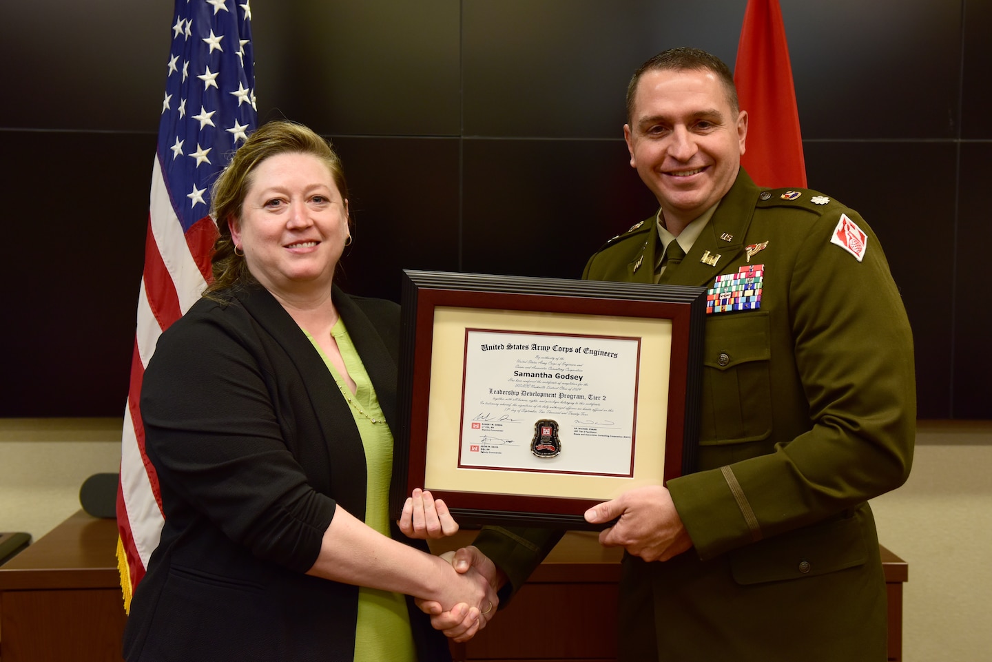 Samantha Godsey, U.S. Army Corps of Engineers Nashville District, receives a certificate of completion for the 2024 Leadership Development Program Level II Course from Lt. Col. Robert W. Green, Nashville District commander, during a graduation ceremony Sept. 11, 2024, at the district headquarters in Nashville, Tennessee. (USACE Photo by Lee Roberts)