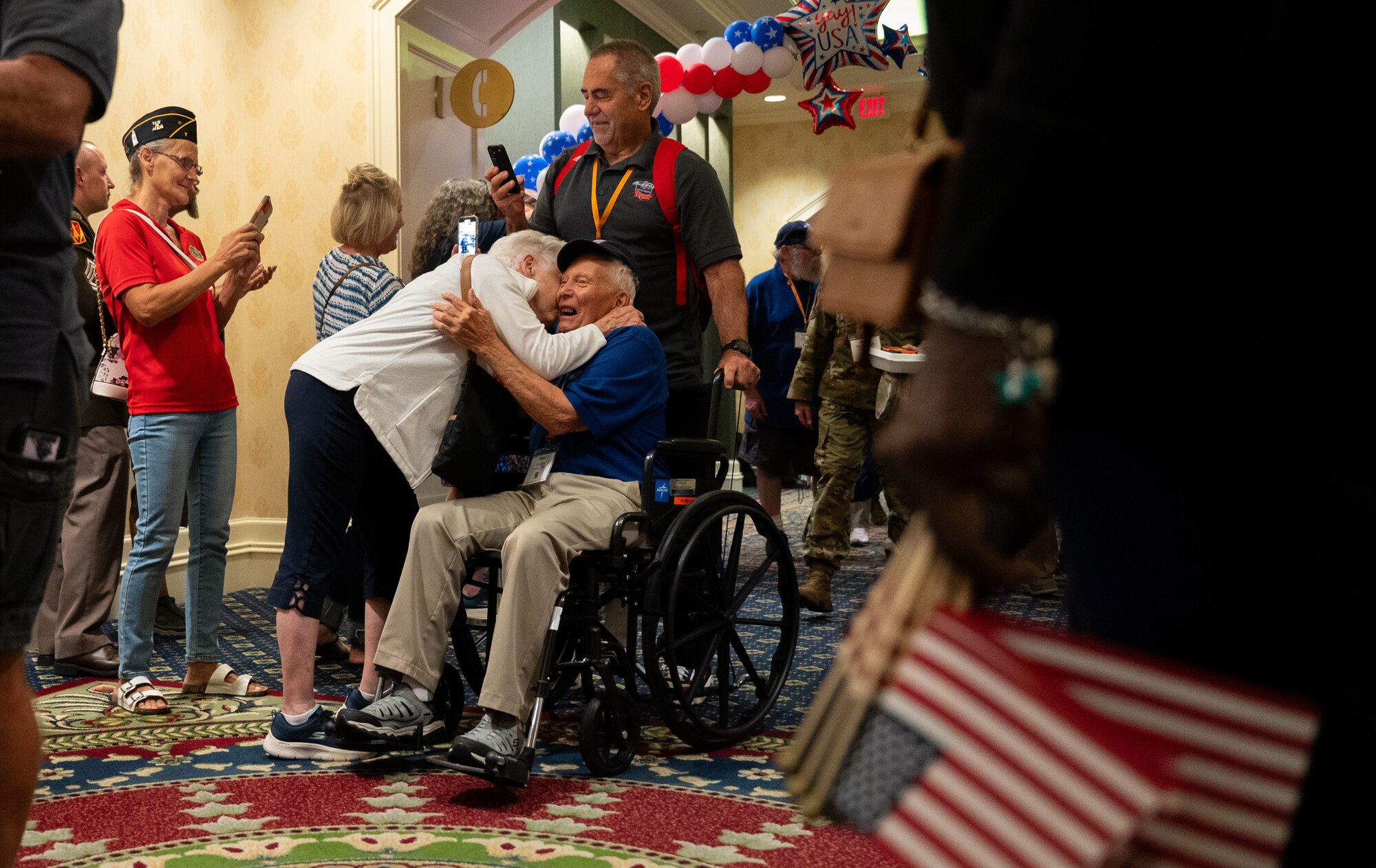 Paul George, U.S. Army veteran, is greeted by his wife upon his return with the Capital Region Honor Flight at Bally’s Dover Casino Resort, Dover, Delaware, Sept. 12, 2024. The Honor Flight is a program for U.S. veterans to visit monuments in Washington D.C. for a day, honoring them and giving proper recognition to their service. (U.S. Air Force photo by Airman Liberty Matthews)