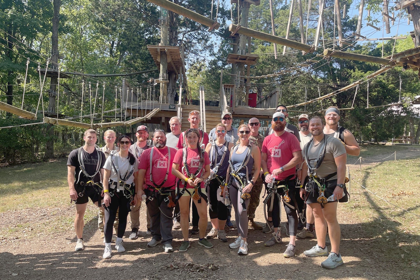 Participants of the U.S. Army Corps of Engineers Nashville District 2024 Leadership Development Program Level II Course pose together Sept. 10, 2024, with Maj. Jesse Davis, Nashville District deputy commander; and Michael Evans, course instructor, during a team building and confidence exercise at The Adventure Park in Nashville, Tennessee. They ziplined more than 50 feet high in the air and overcame challenging obstacles during the class activity. (USACE Photo by Kelley Peck)