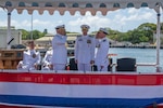240809-N-ENO841-1186 JOINT BASE PEARL HARBOR-HICKAM (Aug. 9, 2024) Cmdr. Thomas Futch, incoming commanding officer of the Los Angeles-class fast-attack submarine USS Charlotte (SSN 766), left, relieves Cmdr. Anthony Stranges, outgoing commanding officer of Charlotte, right, during the boat's change of command ceremony on Joint Base Pearl Harbor-Hickam, Hawaii, Aug. 9, 2024.  Charlotte can support various missions, including anti-submarine warfare, anti-surface ship warfare, strike warfare, intelligence, surveillance, and reconnaissance. (U.S. Navy photo by Electronics Technician Navigation 2nd Class Vincent Polito)