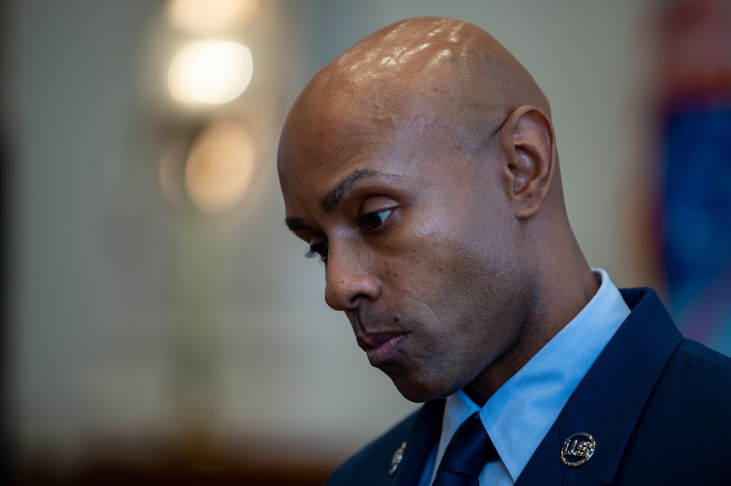 U.S. Air Force Chief Master Sgt. Dion Bullock, 23rd Civil Engineer Squadron fire chief, prepares for an interview at Lowndes County Courthouse, Valdosta, Georgia, Sept. 11, 2024. Local news outlets and other reporters were at the memorial to capture this important event. (U.S. Air Force photo by Airman 1st Class Iain Stanley)