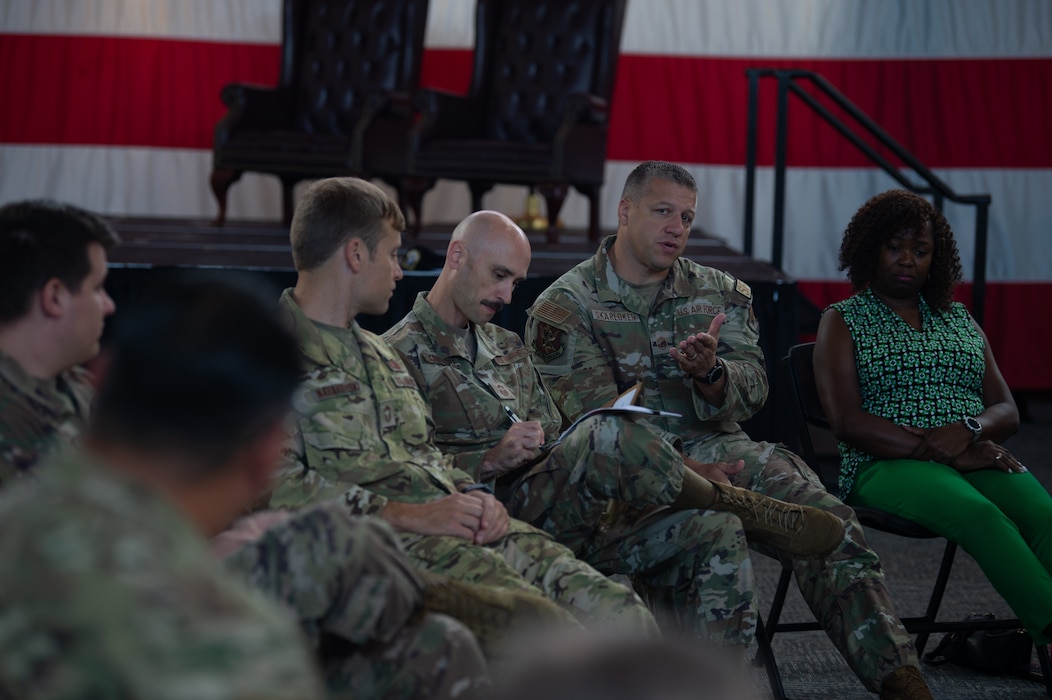 U.S. Air Force Airmen and members of Team Moody hold discussions at Moody Air Force Base, Georgia, Sept. 10, 2024. The town hall style event allowed attendees to freely talk about their own experiences with mental health challenges. (U.S. Air Force photo by Airman 1st Class Iain Stanley)