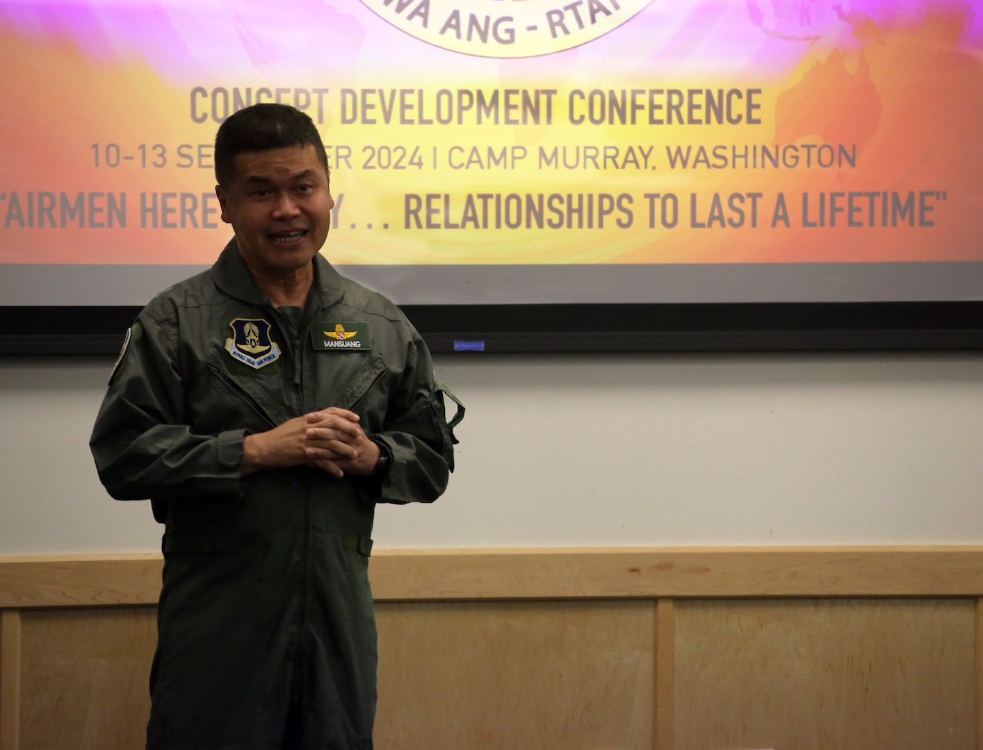 Air Vice Marshal Mansuang Suwan, air exercise working group lead, Royal Thai Air Force, speaks during the Enduring Partners 2025 Concept Development Conference closing ceremonies, Sept. 12, 2024, at Camp Murray, Wash. The conference gives members of the Washington Air National Guard and Royal Thai Air Force a baseline for the final planning conference in early 2025.