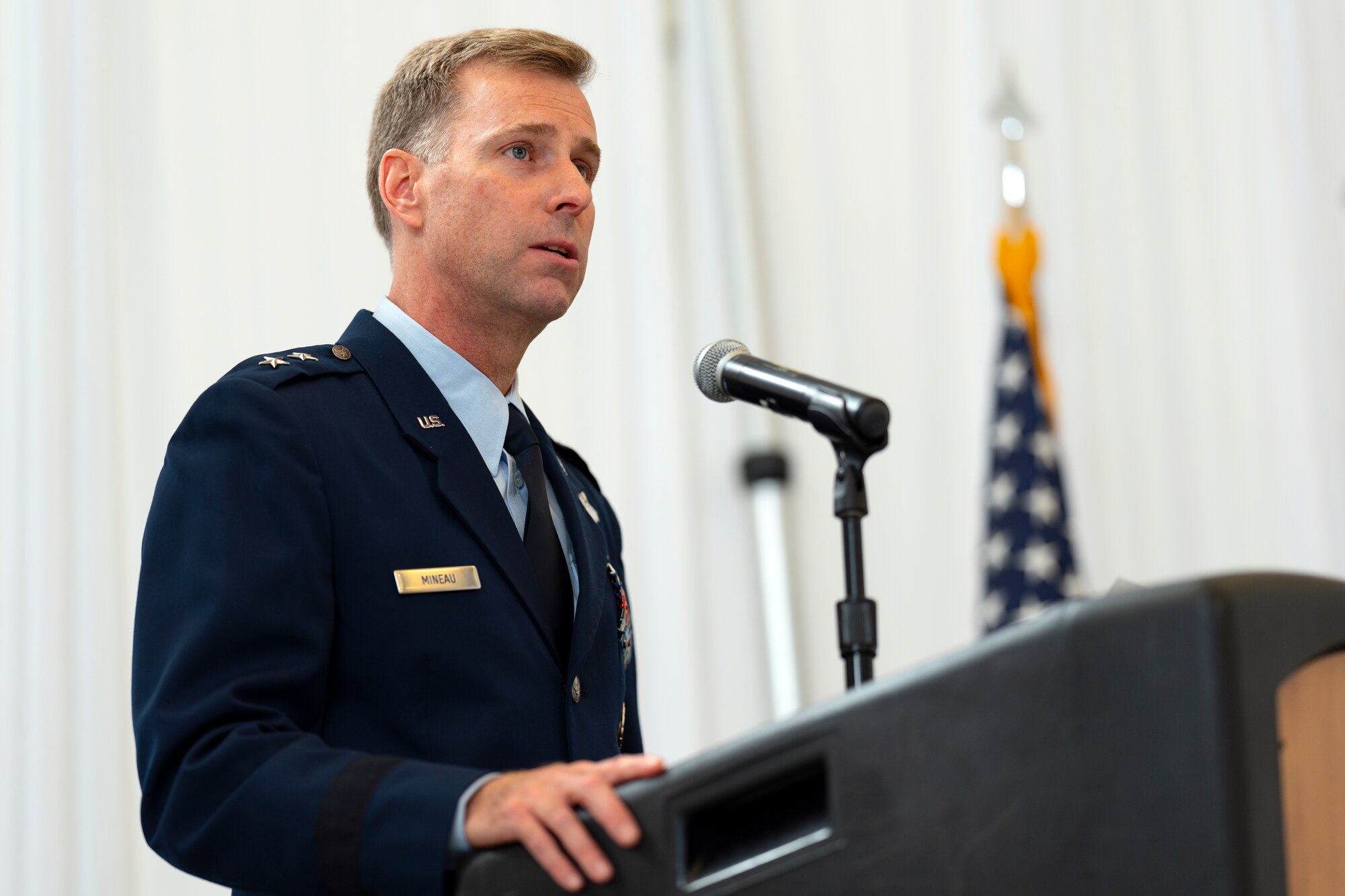 Maj. Gen. David Mineau, newly-appointed Air Forces Southern commander, speaks during a Change of Command ceremony at Davis-Monthan Air Force Base, Arizona, Sep. 11, 2024. Mineau assumed command after Maj. Gen. Evan Pettus, who will become the military deputy commander for U.S. Southern Command. (U.S. Air Force photo by Tech. Sgt. Rachel Maxwell)