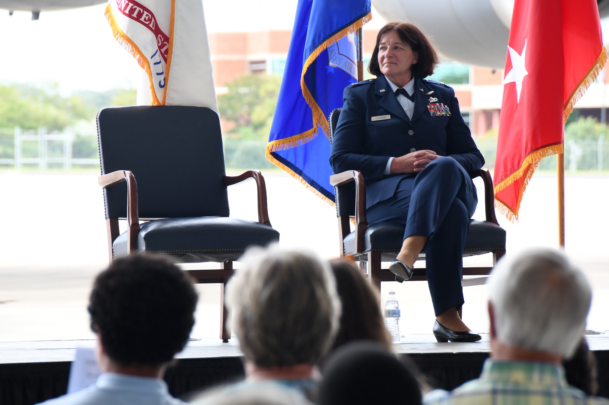 U.S. Air Force Brig. Gen. Shawne M. Johnson, Chief of Staff for the North Carolina Air National Guard (NCANG), listens as U.S. Army Major Gen. Todd Hunt, the Adjutant General of the North Carolina National Guard officiates her promotion inside a C-17 Globemaster III hangar held at the Charlotte-Douglas International Airport base, Sept. 8, 2024.