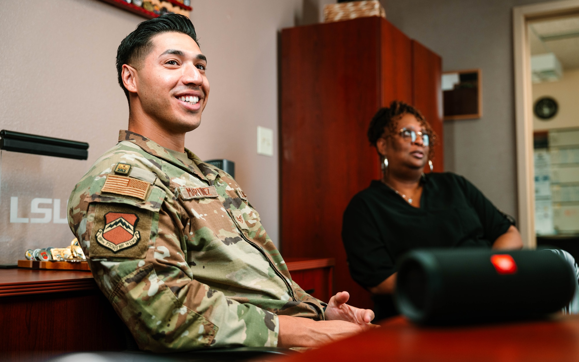 Staff Sgt. Christian Martinez (left), 56th Fighter Wing protocol specialist, and Capt. Nick Belinski (right), 309th Fighter Squadron instructor pilot, have been selected to join the U.S. Air Force Thunderbirds for the 2025-2026 show seasons. Martinez will support the team in scheduling, while Belinski will serve as the narrator and advance pilot.